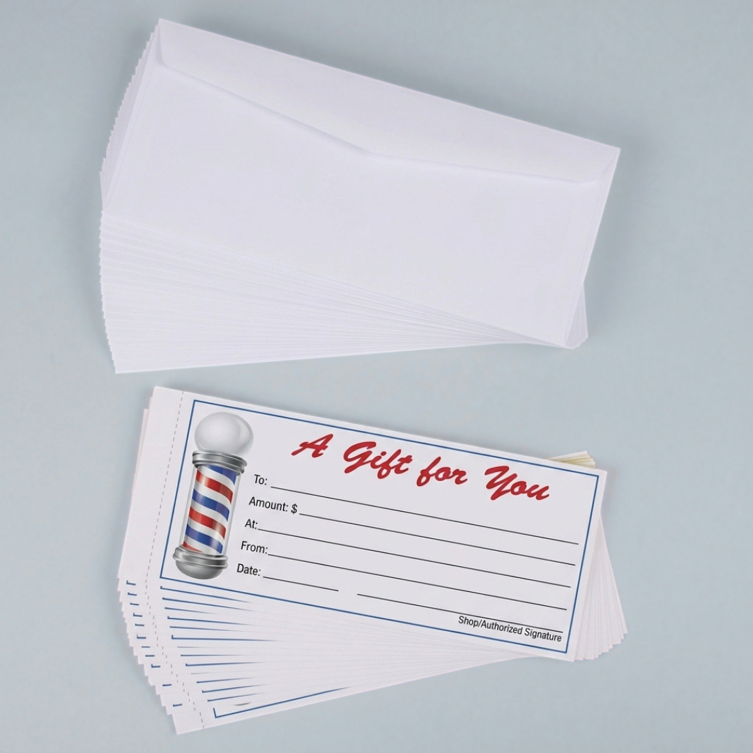 Barbershop gift certificates shown in a stack of 12 as well as the white envelopes stacked along side on a grey background